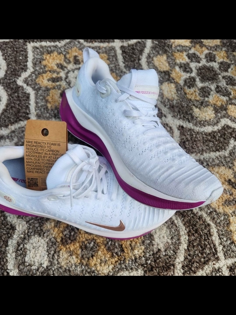 Nike Women’s White Running Shoes with Pink and Rose Gold Accents